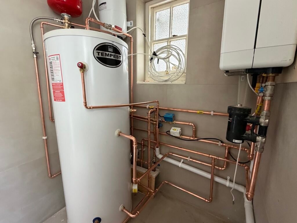 Unvented cylinder and new copper pipework installed by Heating Engineer Essex